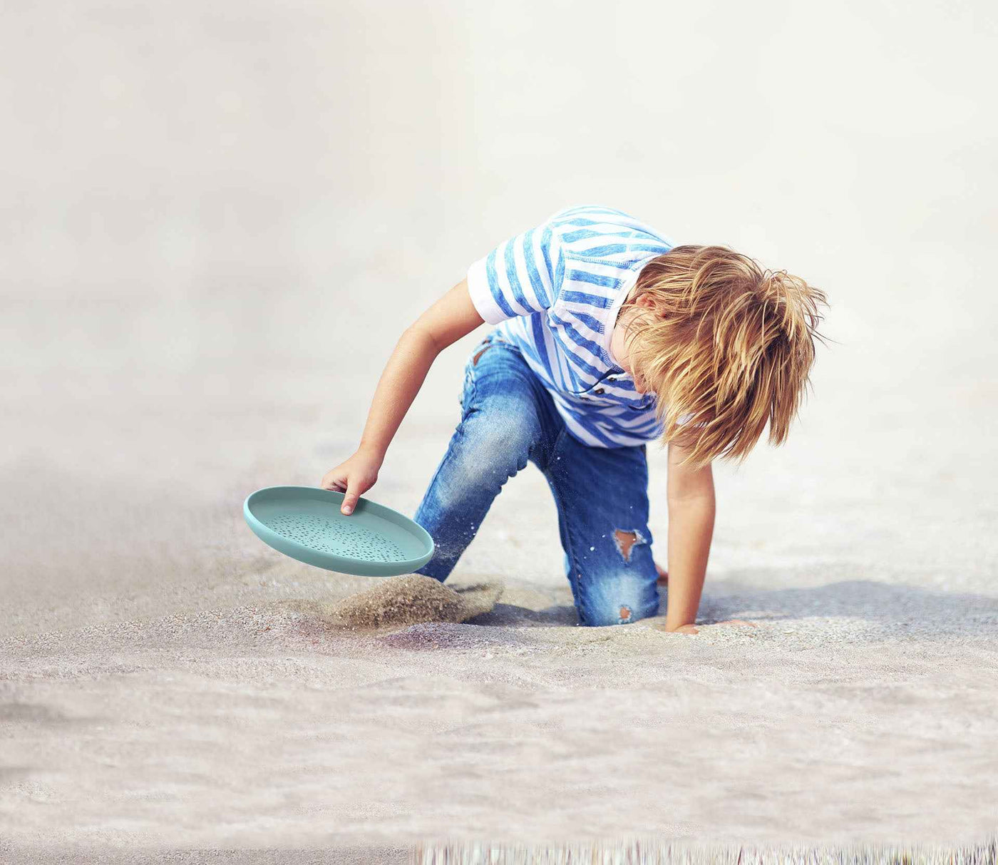 Quut | Flying Disc & Sand Sifter