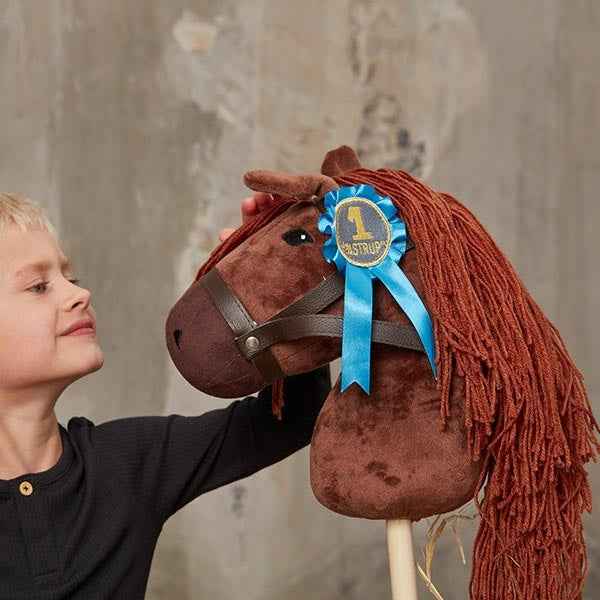 By Astrup rozetten voor stokpaarden