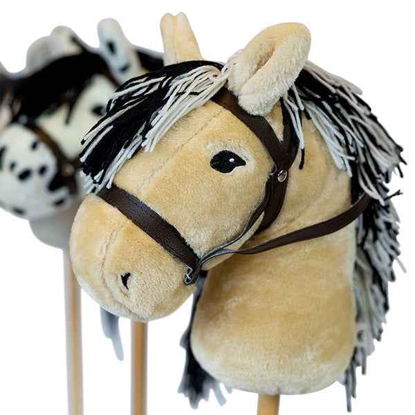 By Astrup white spotted hobby horse
