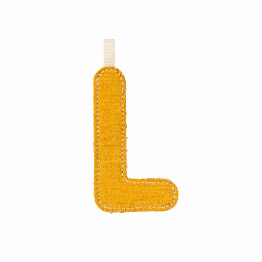 Lilliputiens | Letter L in ochre yellow phosphorescent material