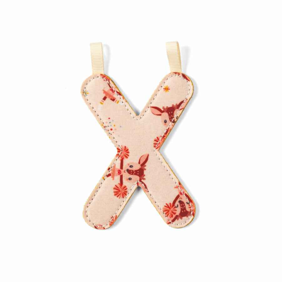 Lilliputiens | Letter X in Reversible Phosphorescent Material